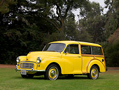 AUT 21 RK2020 01
1959 Morris Mini Minor Traveller Yellow Woody Low 3/4 Side View On Grass By Trees