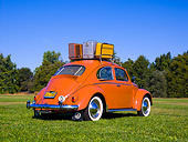 AUT 21 RK2029 01
1958 Volkswagen Beetle Coral Low 3/4 Rear View On Grass Trees Background