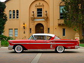 AUT 21 RK2047 01
1958 Chevrolet Impala Red White Top Low Profile View On Pavement