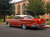AUT 21 RK2051 01
1958 Chevrolet Impala Red White Top 3/4 Rear View On Pavement