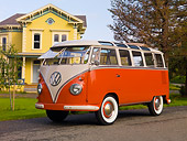 AUT 21 RK2086 01
1956 Volkswagen Deluxe Microbus Salmon And Tan 3/4 Side View On Pavement