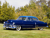 AUT 21 RK2125 01
1953 Cadillac Fleetwood 60 Special Blue Front 3/4 View On Grass By Trees
