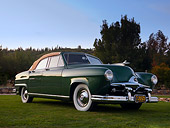 AUT 21 RK2130 01
1951 Frazer Manhattan 4-Door Convertible Green Front 3/4 View On Grass By Trees Sky