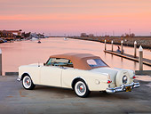 AUT 21 RK2182 01
1953 Packard Caribbean Convertible Ivory 3/4 Rear View By Water