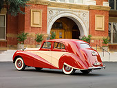 AUT 21 RK2217 01
1951 Bentley Mk VI Harold Radford Countryman Saloon Maroon & Tan 3/4 Rear View By Building