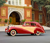 AUT 21 RK2218 01
1951 Bentley Mk VI Harold Radford Countryman Saloon Maroon & Tan 3/4 Front View By Building