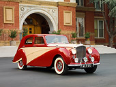 AUT 21 RK2219 01
1951 Bentley Mk VI Harold Radford Countryman Saloon Maroon & Tan 3/4 Front View By Building