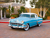 AUT 21 RK2235 01
1954 Chevrolet Bel Air Sport Coupe Turquoise 3/4 Front View By Trees