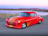 AUT 21 RK2272 01
1950 Oldsmobile 88 Hot Rod Red With Flames Custom Coupe 3/4 Front View On Pavement By Water