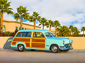 AUT 21 RK2279 01
1950 Ford Woody Station Wagon Green 3/4 Front View On Pavement By Palm Trees