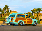 AUT 21 RK2281 01
1950 Ford Woody Station Wagon Green 3/4 Rear View On Pavement By Palm Trees