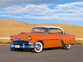 AUT 21 RK2289 01
1954 Pontiac Chieftain Orange 3/4 Front View On Pavement By Hills