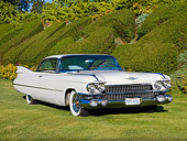 AUT 21 RK2310 01
1959 Cadillac Coupe White 3/4 Front View On Grass By Hedge