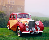 AUT 21 RK2320 01
1951 Bentley Mk VI Harold Radford Countryman Saloon Maroon & Tan 3/4 Front View On Grass