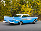 AUT 21 RK2329 01
1959 Plymouth Belvedere Blue And White 3/4 Rear View On Pavement By Trees