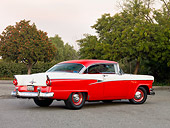 AUT 21 RK2337 01
1956 Ford Customline Victoria Red And White 3/4 Rear View On Pavement By Trees