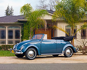 AUT 21 RK2355 01
1959 Volkswagen Cabriolet Beetle Blue 3/4 Front View On Gravel By House