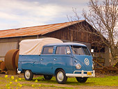 AUT 21 RK2359 01
1959 Volkswagen Binz Double Cab Bus Blue 3/4 Front View On Grass By Barn