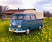 AUT 21 RK2363 01
1959 Volkswagen Binz Double Cab Bus Blue 3/4 Front View In Field Of Yellow Wildflowers