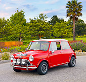 AUT 22 BK0018 01
1960 Mini Mark I Red 3/4 Front View On Pavement By Trees