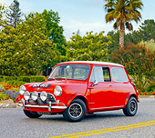AUT 22 BK0019 01
1960 Mini Mark I Red 3/4 Front View On Pavement By Trees