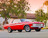 AUT 22 BK0037 01
1963 Plymouth Fury Red 3/4 Front View On Pavement By Building