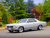 AUT 22 BK0056 01
1966 Chevrolet Chevelle SS Silver 3/4 Front View On Pavement By Trees