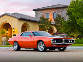 AUT 22 BK0080 01
1973 Dodge Charger 440 Magnum R/T Orange With Black Stripe 3/4 Front View On Pavement By House