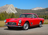 AUT 22 BK0112 01
1960 Maserati 3500 GT 3/4 Front View On Pavement In Mountains