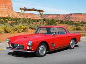 AUT 22 BK0113 01
1960 Maserati 3500 GT Red 3/4 Front View On Road In Desert