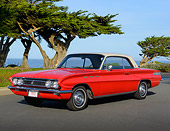 AUT 22 BK0128 01
1962 Buick Skylark Red 3/4 Front View On Pavement By Water