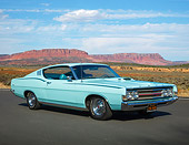 AUT 22 BK0130 01
1969 Ford Torino GT Aqua Blue 3/4 Front View On Road In Desert