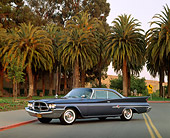 AUT 22 RK0047 08
1960 Chrysler 300F Sport Coupe 3/4 Side View On Road By Palm Trees