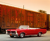 AUT 22 RK0151 01
1965 Pontiac GTO Convertible Red 3/4 Side View By Train
