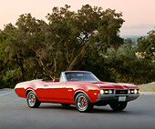 AUT 22 RK0297 05
1968 Oldsmobile 442 Convertible Red 3/4 Side View On Pavement