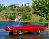 AUT 22 RK0319 16
1968 Pontiac GTO Convertible Red 3/4 Side View On Wet Pavement By Water And Grass Hills