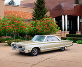 AUT 22 RK0482 02
1966 Chrylser 300 C Gold 3/4 Side View On Pavement