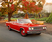 AUT 22 RK1256 02
1965 Dodge Cornet 500 Convertible Red 3/4 Front View On Pavement By Pumpkins And Fall Trees