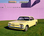 AUT 22 RK1347 08
1964 Chevrolet Corvair Monza Sport Coupe Yellow 3/4 Front View On Grass