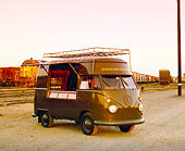 AUT 22 RK1619 04
1966 VW Highroof Sales Van Army Green 3/4 Front View On Dirt By Railroad Tracks