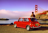 AUT 22 RK1744 06
1967 Austin Mini Cooper S Red And White 3/4 Rear View By Golden Gate Bridge With Man