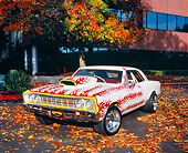 AUT 22 RK2136 01
1967 Chevy Chevelle White With Flames 3/4 Front View By Fall Tree And Building