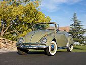AUT 22 RK2810 01
1965 Volkswagen Beetle Cabriolet Green 3/4 Front View On Pavement By Stone Wall And Trees