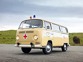 AUT 22 RK2818 01
1968 Volkswagen Bus Ambulance Cream 3/4 Front View On Pavement By Hills