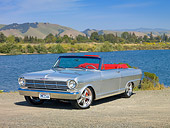 AUT 22 RK2820 01
1962 Chevrolet Nova 400 Convertible Silver 3/4 Front View On Gravel By Lake And Hills