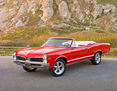 AUT 22 RK2824 01
1967 Pontiac OHC Sprint Convertible Red 3/4 Front View On Pavement By Sand Dune