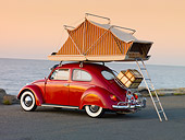 AUT 22 RK2832 01
1964 Volkwagen Beetle Red With Topper Tent 3/4 Rear View On Pavement By Ocean