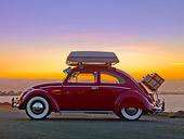AUT 22 RK2838 01
1964 Volkwagen Beetle Red With Topper Tent Profile View On Pavement By Ocean
