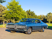 AUT 22 RK2923 01
1968 Pontiac Grand Prix Blue 3/4 Front View On Pavement By Trees