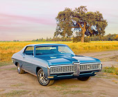 AUT 22 RK2925 01
1968 Pontiac Grand Prix Blue 3/4 Front View On Dirt Road By Field And Tree
